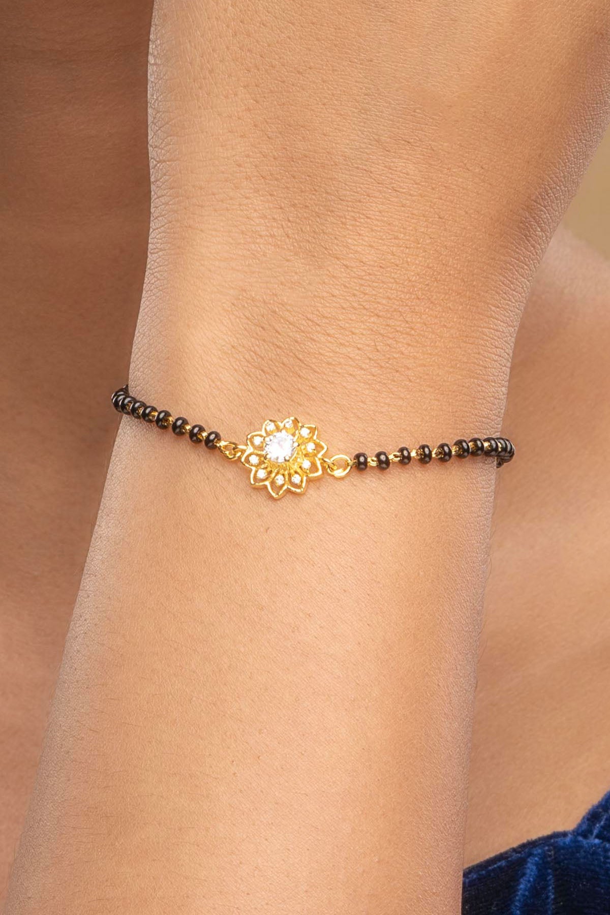 Buy Gold Surajmukhi Hand Mangalsutra by Sica for women online at ScrollnShops